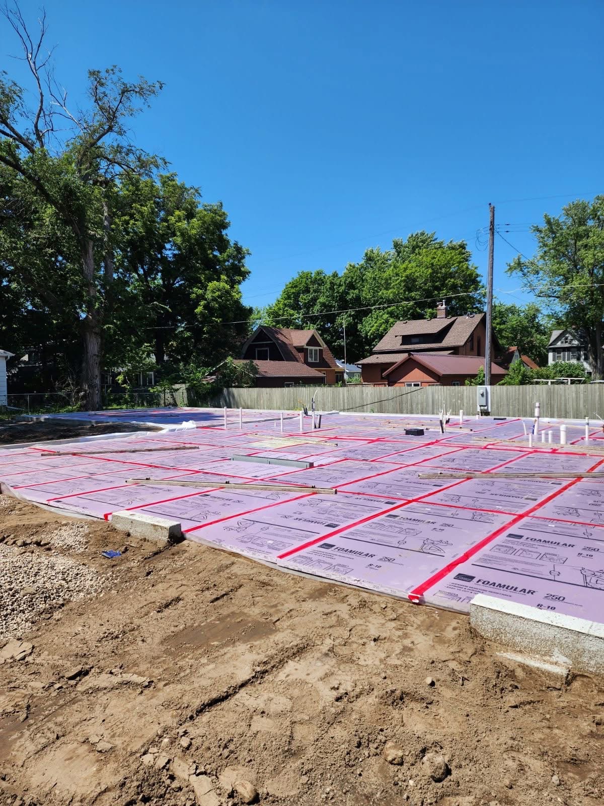 Insulation and in-floor heat tubing prepped before a slab pour